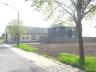 Woning met multifunctioneel bijgebouw (huidige handelszaak-atelier). Moderne woning, halfopen bebouw